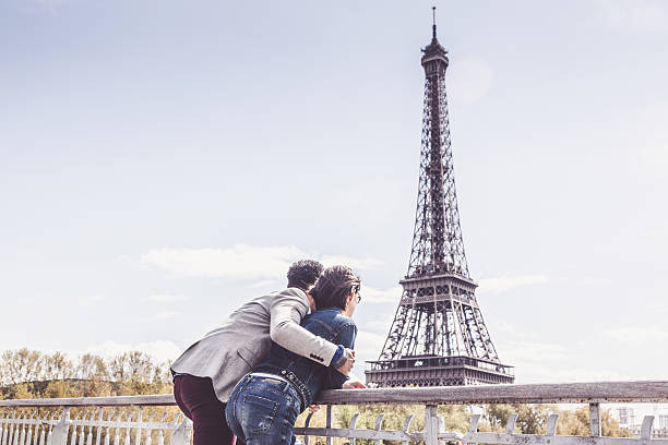 istock Multi-ethnic couple having fun in Paris near Eiffel Tower 626661322