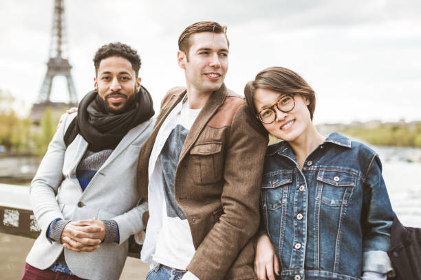 istock Multi-ethnic group of friends having fun in Paris along Seine 626667728