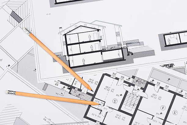 construction plans with drawing tools on blueprints - instrument of measurement organization housing project housing development imagens e fotografias de stock