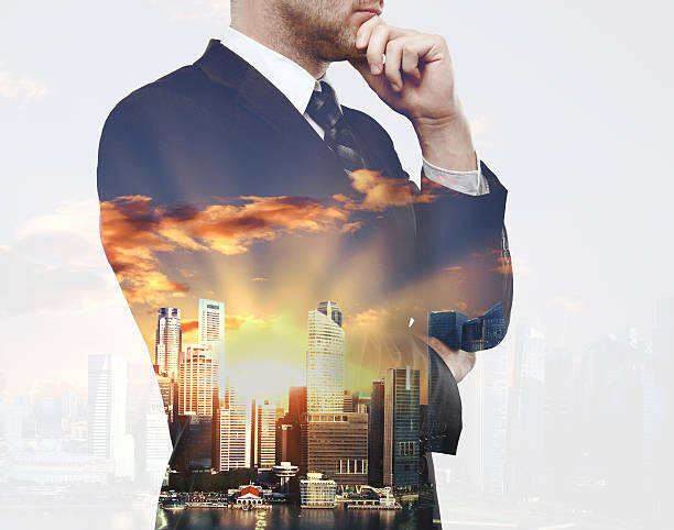 istock Thoughtful man on city background 626669874