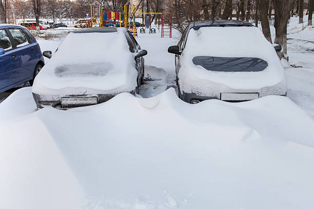 istock Cars covered in snow 626679336