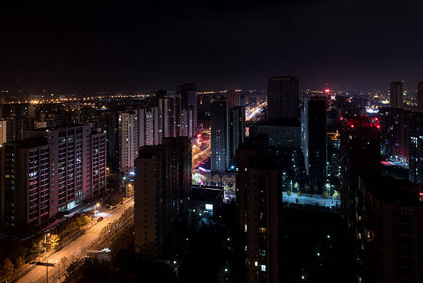 istock Qingdao city skyscrapers by night 626679752
