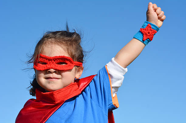 istock Superhero child - girl power 626680450