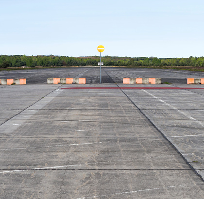 Abandoned concrete airfield / airport runway