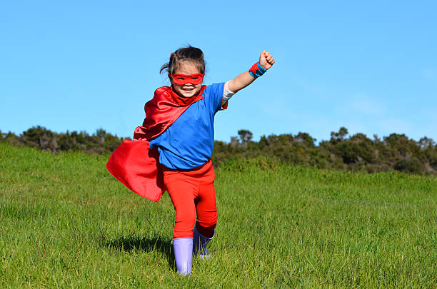 istock Superhero child - girl power 626681616