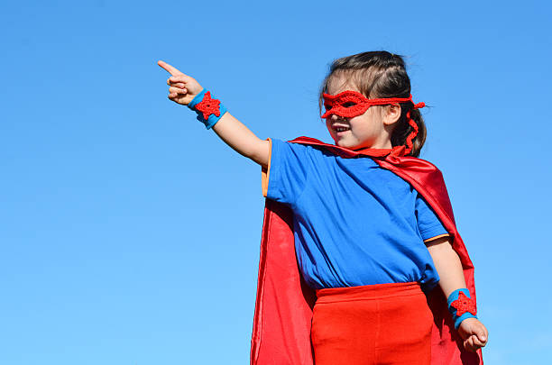 istock Superhero child - girl power 626681786