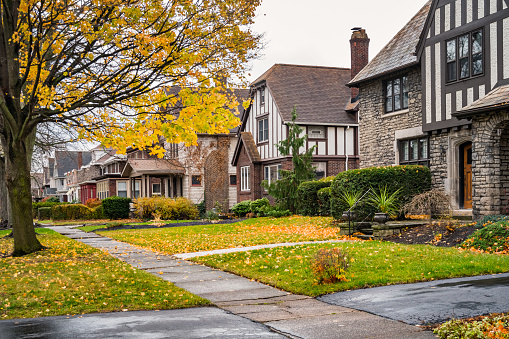 Photo of a row of homes in a residential district in downtown Niagara Falls, New York State, USA during Autumn.