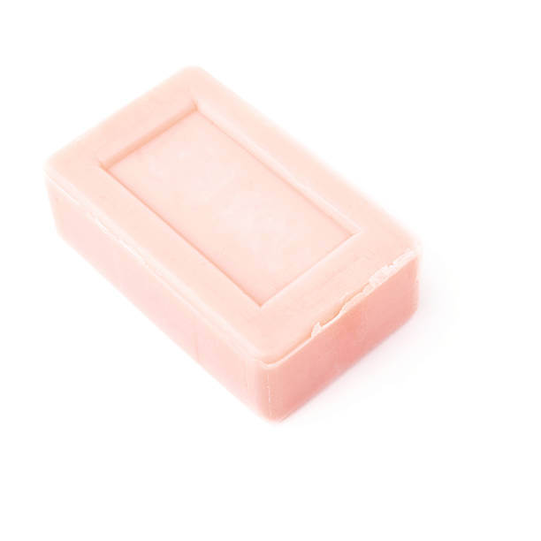 istock Pink soap bar isolated over white background 626685440