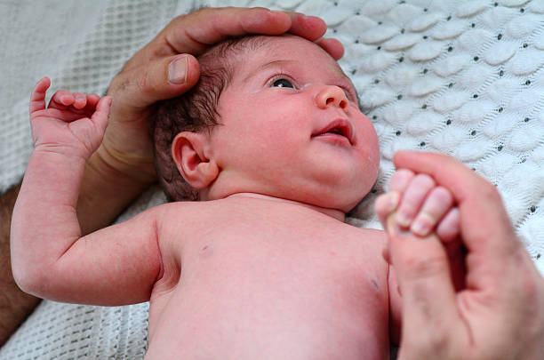 istock Father touch Newborn baby - portrait 626685976