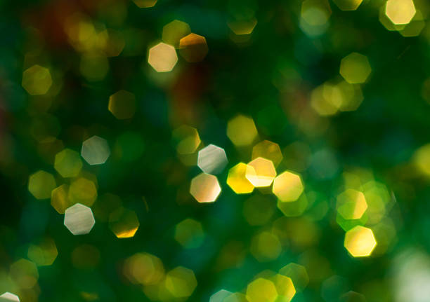 istock Green background with yellow bokeh, blurred background 626698216