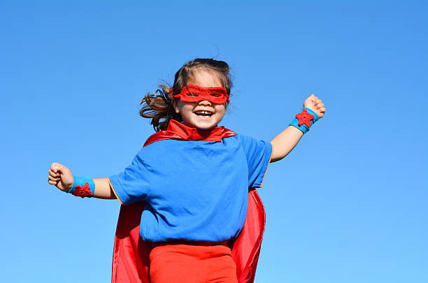 istock Superhero child - girl power 626702474