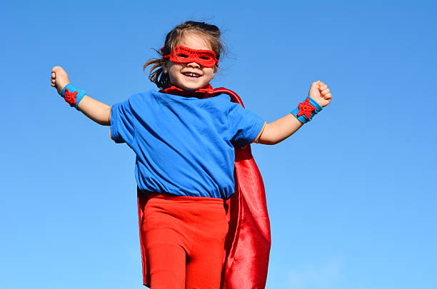 istock Superhero child - girl power 626702488