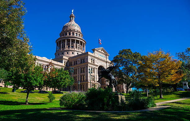Wide view of the Texas Capitol Front With Texas Ranger Statue