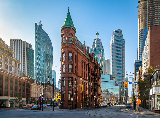 Building in downtown Toronto - Ontario, Canada Building in downtown Toronto with CN Tower on background - Toronto, Ontario, Canada toronto stock pictures, royalty-free photos & images