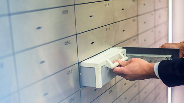 istock Accessing bank safety deposit box 626723328