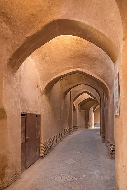 istock Old passage with traditional clay arches 626724826