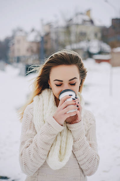 istock beautiful girl on winter walk 626725372