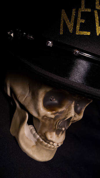 istock Plastic Skull Wearing New Year Top Hat - Dutch Angle 626740360