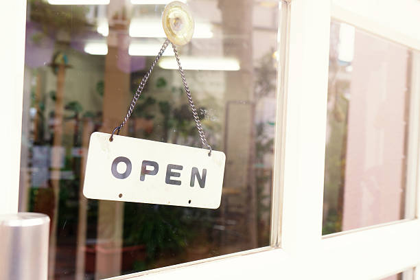 istock Open message wording sign label in front door 626750648