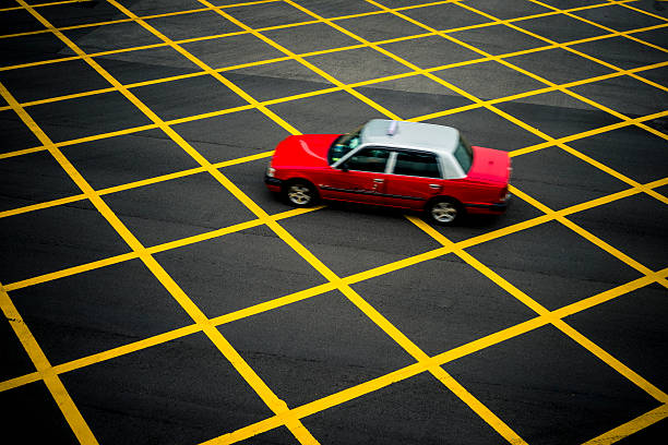 taxi driving through no parking area,Hong Kong,high angle view.