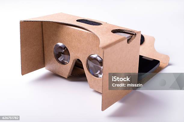 Virtual Reality Cardboard Headset With A Smartphone Over White Stock Photo - Download Image Now