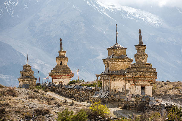 Traditional old Buddhist stupas on Annapurna Circuit Trek stock photo