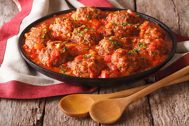 Albondigas meatballs with tomato sauce on a plate close-up stock photo