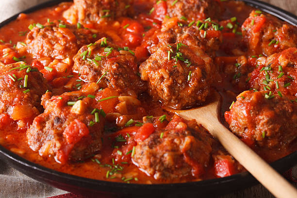 istock Albondigas meatballs with spicy sauce on a dish macro. horizontal 626752388