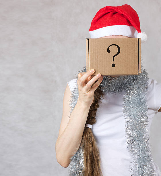 istock Young lady in Santa Claus hat 626753250
