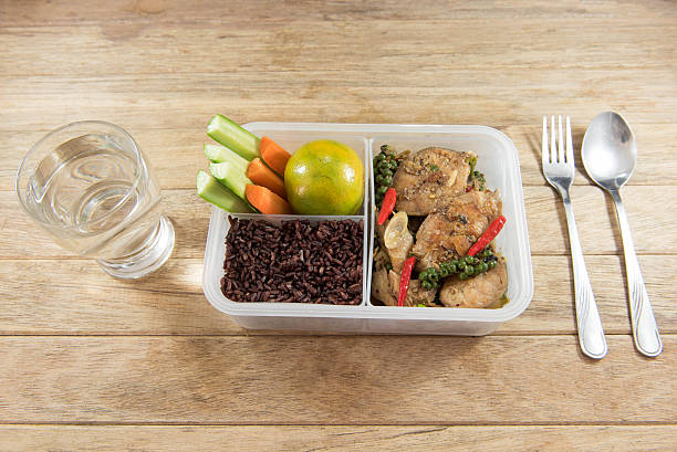istock Spicy stir-fried catfish and riceberry in lunch box, 626755872