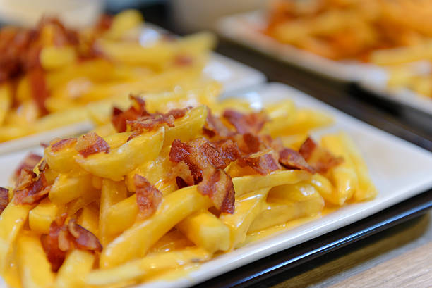 istock French fries and cheese with bacon on top 626756260