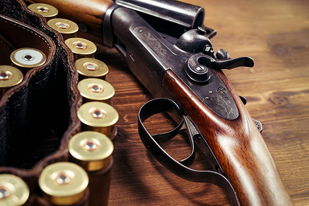 istock Shotgun on wooden background 626771868