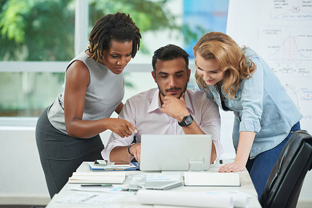istock Business team at laptop 626774872