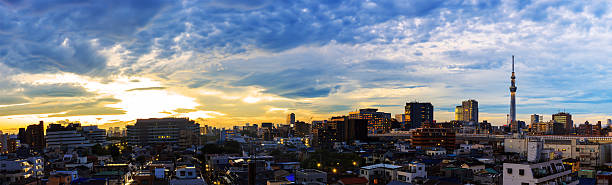 istock Sunset over building in  Tokyo , Japan at dusk with light 626775072