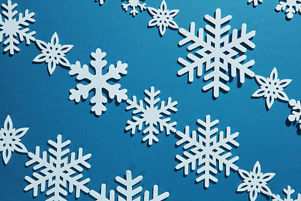 istock Christmas background of snowflakes 626775334