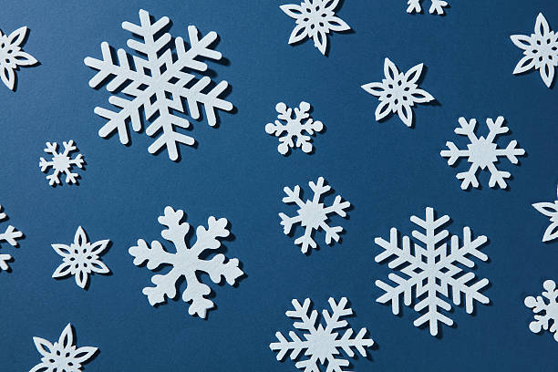 istock beautiful winter background of snowflakes 626776538