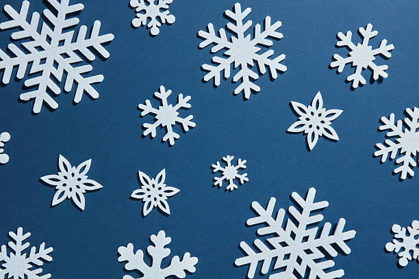 istock beautiful winter background of snowflakes 626776686