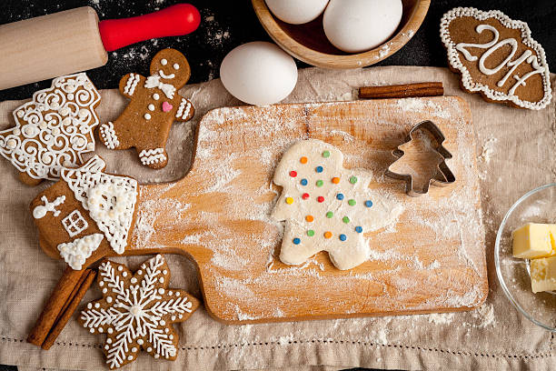 istock cooking christmas gingerbread on wooden background top view 626777920
