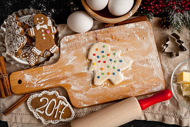 istock cooking christmas gingerbread on wooden background top view 626778272
