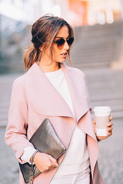 istock Beautiful elegant woman drinking coffee 626778624