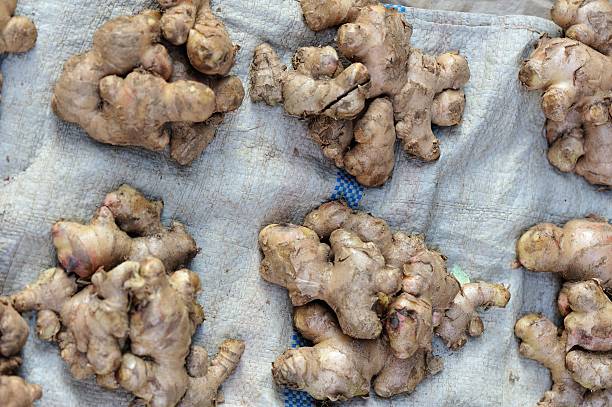 istock fresh ginger selling at market 626779498