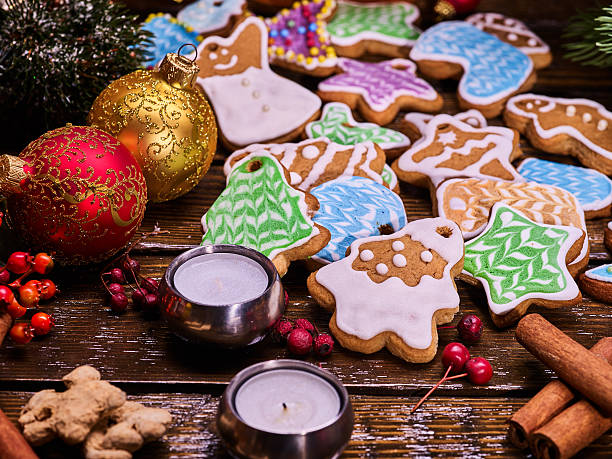 istock Christmas cookies on wooden table. 626783540
