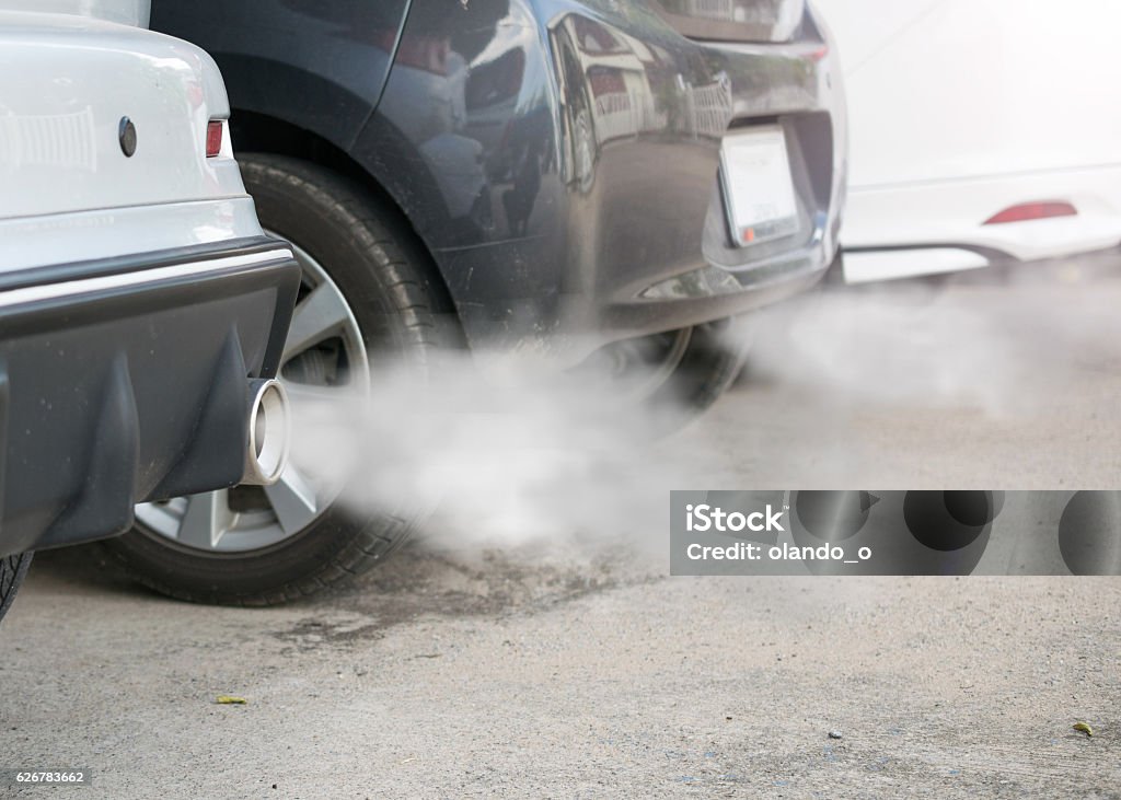 combustion fumes coming out of car exhaust pipe Car Stock Photo