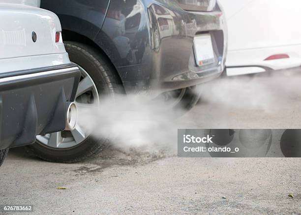 Combustion Fumes Coming Out Of Car Exhaust Pipe Stock Photo - Download Image Now - Car, Carbon Dioxide, Greenhouse Gas
