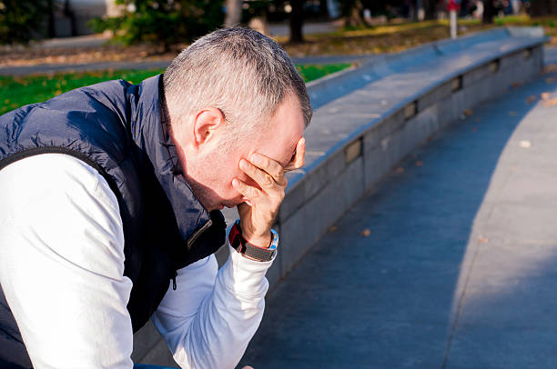 istock Businessman in depression with hands on forehead 626783988