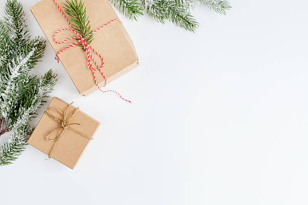 istock packaging christmas gifts in boxes on white background top view 626784412