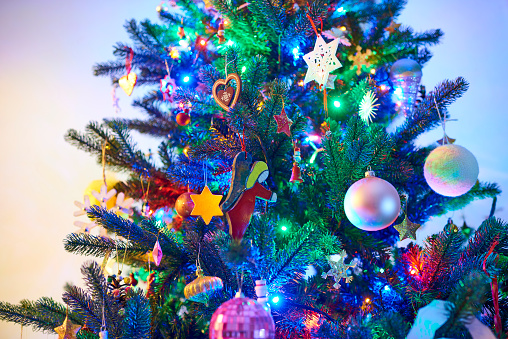 Closeup of an illuminated Christmas Tree.