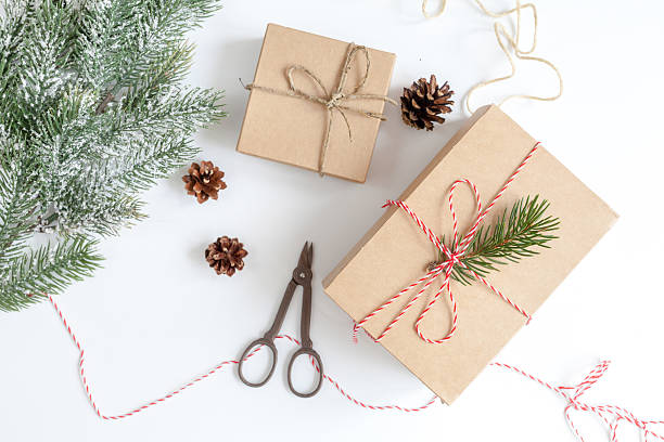 istock packaging christmas gifts in boxes on white background top view 626784508