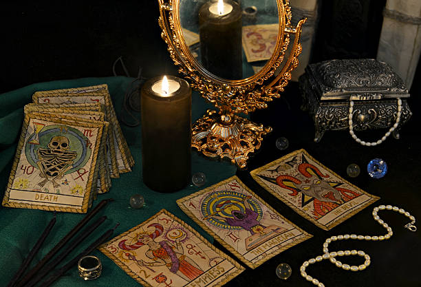 istock Esoteric still life with the Tarrot cards, mirrow and crystals 626785234