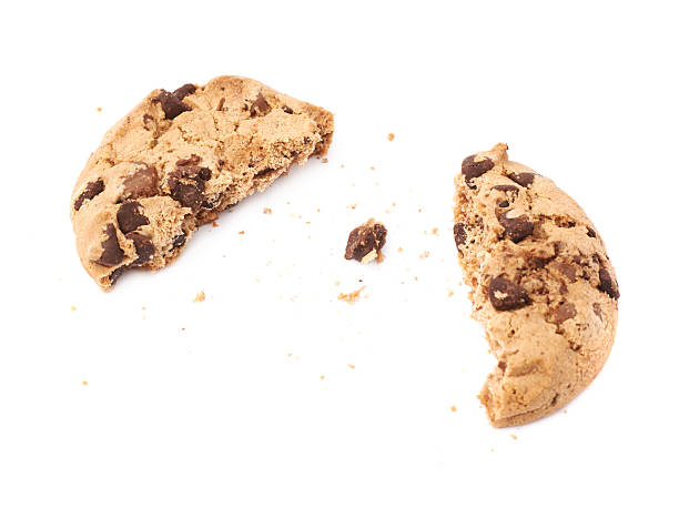 istock Broken into pieces cookie isolated over the white background 626788404